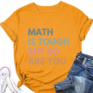 Close-up of ginger yellow t-shirt with Math Is Tough print and casual outfit styling