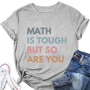 Flat lay of gray T-shirt with 'Math Is Tough But So Are You' print and stylish knot
