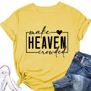Flat lay of yellow t-shirt with make heaven crowded text print and blue jeans