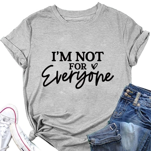 Flat lay of gray crewneck t-shirt with I'M NOT FOR EVERYONE slogan and denim detail