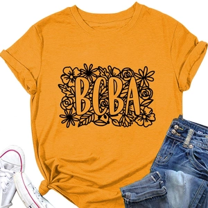 Detailed flat lay of a ginger BCBA t-shirt with floral graphic and denim styling