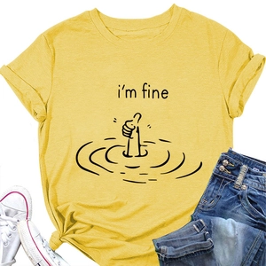 Flat lay of yellow cotton t-shirt with i'm fine print, blue jeans and white sneakers