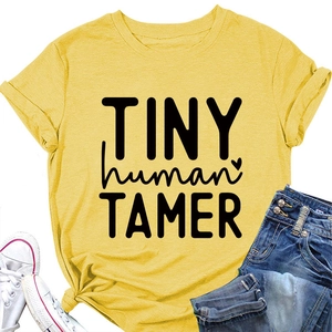 Detail view of yellow Tiny Human Tamer cotton T-shirt with rolled sleeves and graphic text
