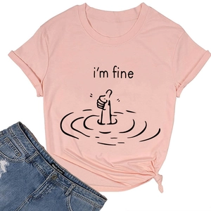 Detail of pink cotton t-shirt featuring 'I'm fine' graphic print and flat lay styling