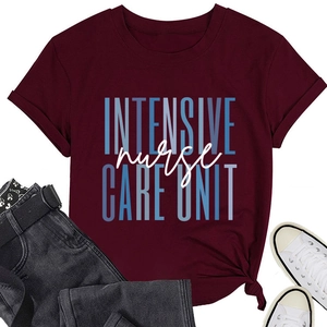 Flat lay of a burgundy nurse care unit t-shirt with black jeans and white sneakers