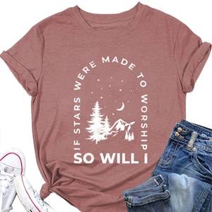 Flat lay of pink If Stars Were Made To Worship t-shirt with sneakers and jeans