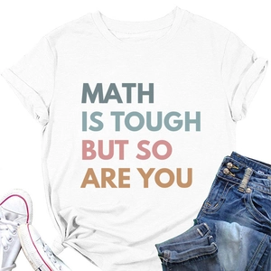 Flat lay of Math Is Tough But So Are You white cotton T-shirt with jeans and sneakers