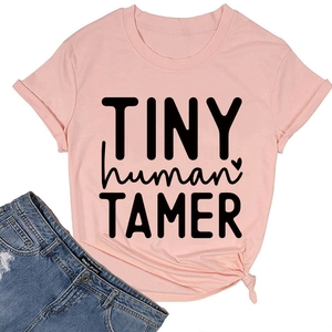 Detail of pink cotton T-shirt featuring TINY human TAMER print and front knot design
