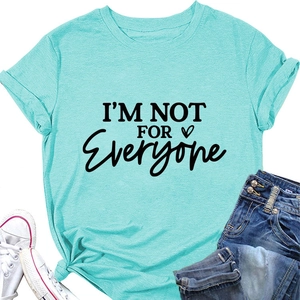 Flat lay of light blue T-shirt with I'M NOT FOR EVERYONE text, jeans and sneakers