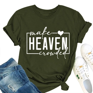 Flat lay of dark green T-shirt with 'make HEAVEN crowded' text and knotted hem detail
