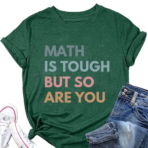 Flat lay of dark green T-shirt with MATH IS TOUGH BUT SO ARE YOU print and blue jeans