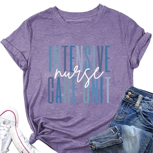 Close-up of purple nurse T-shirt with Intensive Care Unit print and denim shorts