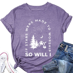 Detailed view of purple graphic t-shirt with forest, mountains and crescent moon print