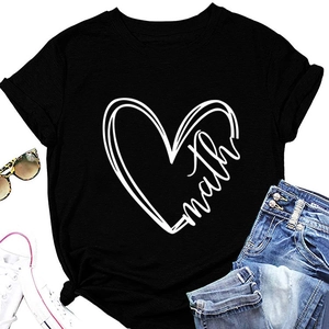 Flat lay of black cotton T-shirt featuring a heart math print and summer accessories