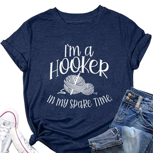 Detail of navy blue t-shirt with I'm a Hooker knitting print and yarn ball graphic