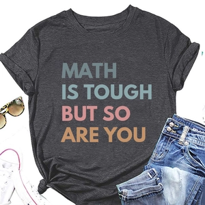 Flat lay of charcoal grey t-shirt with 'Math is tough but so are you' print and accessories