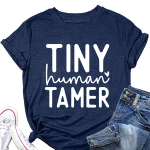 Navy blue Tiny Human Tamer cotton T-shirt flat lay with denim shorts and white sneakers