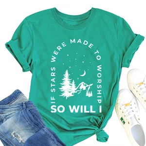 Flat lay of a green vintage T-shirt with mountain print and tied knot detail on the hem