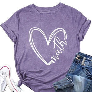 Flat lay of purple heather heart print t-shirt styled with denim jeans and canvas shoes