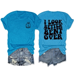 Front and back detail of bright blue T-shirt with artistic text and denim shorts