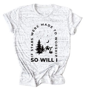 Detail of screen-printed mountain and forest graphic on white crewneck t-shirt