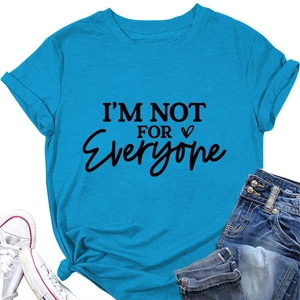 Flat lay of lake blue cotton T-shirt with I'M NOT FOR EVERYONE slogan and denim shorts