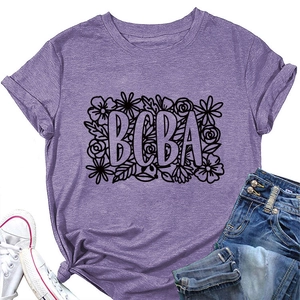 Detailed view of mauve BCBA printed T-shirt with floral design and denim styling