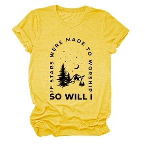 Detail of yellow cotton T-shirt featuring black nature graphic and worship slogan print