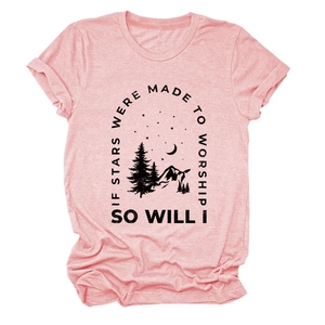 Detail of pink cotton T-shirt featuring nature mountain print and inspirational text