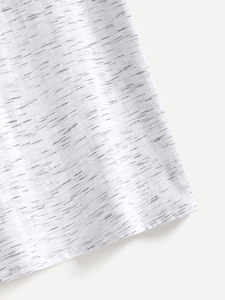 Detailed close-up of gray heather knit fabric and reinforced hem stitching on a T-shirt