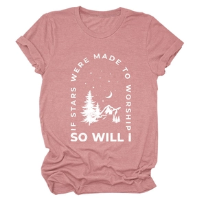 Close-up of the mountain landscape and motivational quote on the pink cotton t-shirt