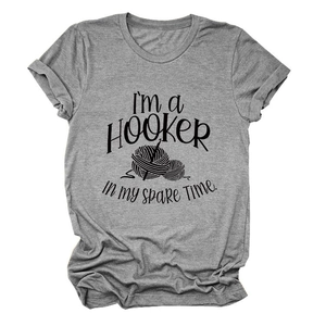 Detail of grey T-shirt featuring I'm a Hooker knitting graphic and soft cotton texture