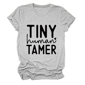 Detail of grey cotton T-shirt featuring TINY human TAMER black letter print design