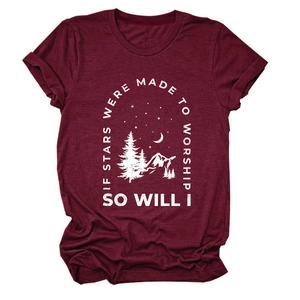Close-up of the mountain landscape print and text on this casual burgundy cotton t-shirt