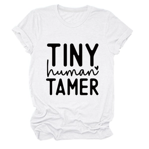 Close-up of Tiny Human Tamer typography on white cotton short sleeve t-shirt