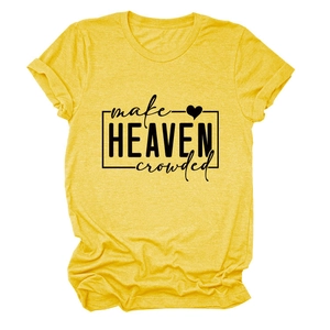 Detail of black 'make HEAVEN crowded' text print on bright yellow cotton t-shirt fabric