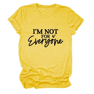 Close-up of I'M NOT FOR EVERYONE slogan and heart print on yellow cotton t-shirt