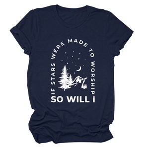 Detail of mountain star print on dark blue cotton t-shirt with inspirational quote