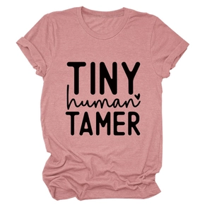 Detail of pink cotton t-shirt with TINY human TAMER text and fine stitching details