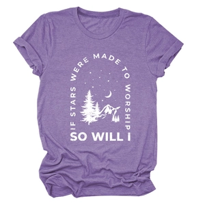 Detailed flat lay of purple heather t-shirt with mountain and forest graphic print