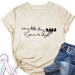 Detail of bird print and text every little thing is gonna be alright on cotton tee