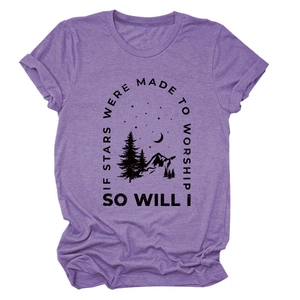 Close-up of purple cotton t-shirt featuring nature-inspired stars and mountain print