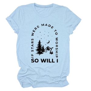 Detail showing the landscape mountain print and worship text on this light blue casual tee
