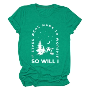 Detail of green cotton t-shirt with mountains and stars graphic print and text