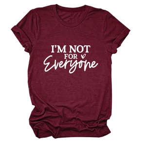 Detail of wine red t-shirt fabric featuring I'M NOT FOR EVERYONE text and heart graphic