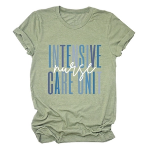 Detail of green nurse care unit t-shirt showing fabric texture and typography print