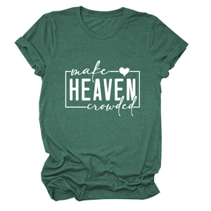 Close-up of make heaven crowded white slogan and heart print on green cotton T-shirt