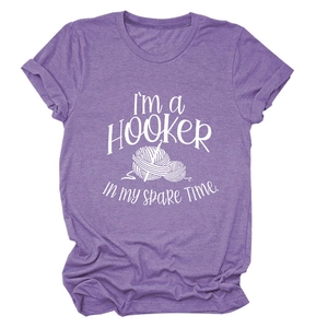 Detail of heathered purple cotton T-shirt with white knitting pun graphic and slogan