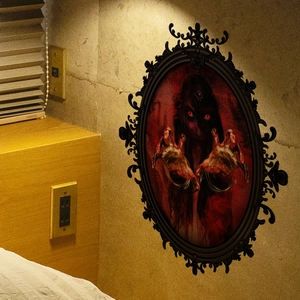 Macro detail of Gothic Halloween wall sticker featuring a spooky female spirit with a vintage frame