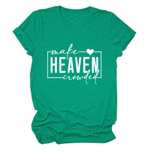 Detailed close-up of white 'make HEAVEN crowded' text print on green cotton t-shirt